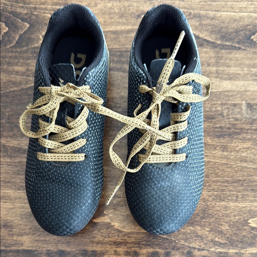 DSG Kids Cleats Black with Gold Laces